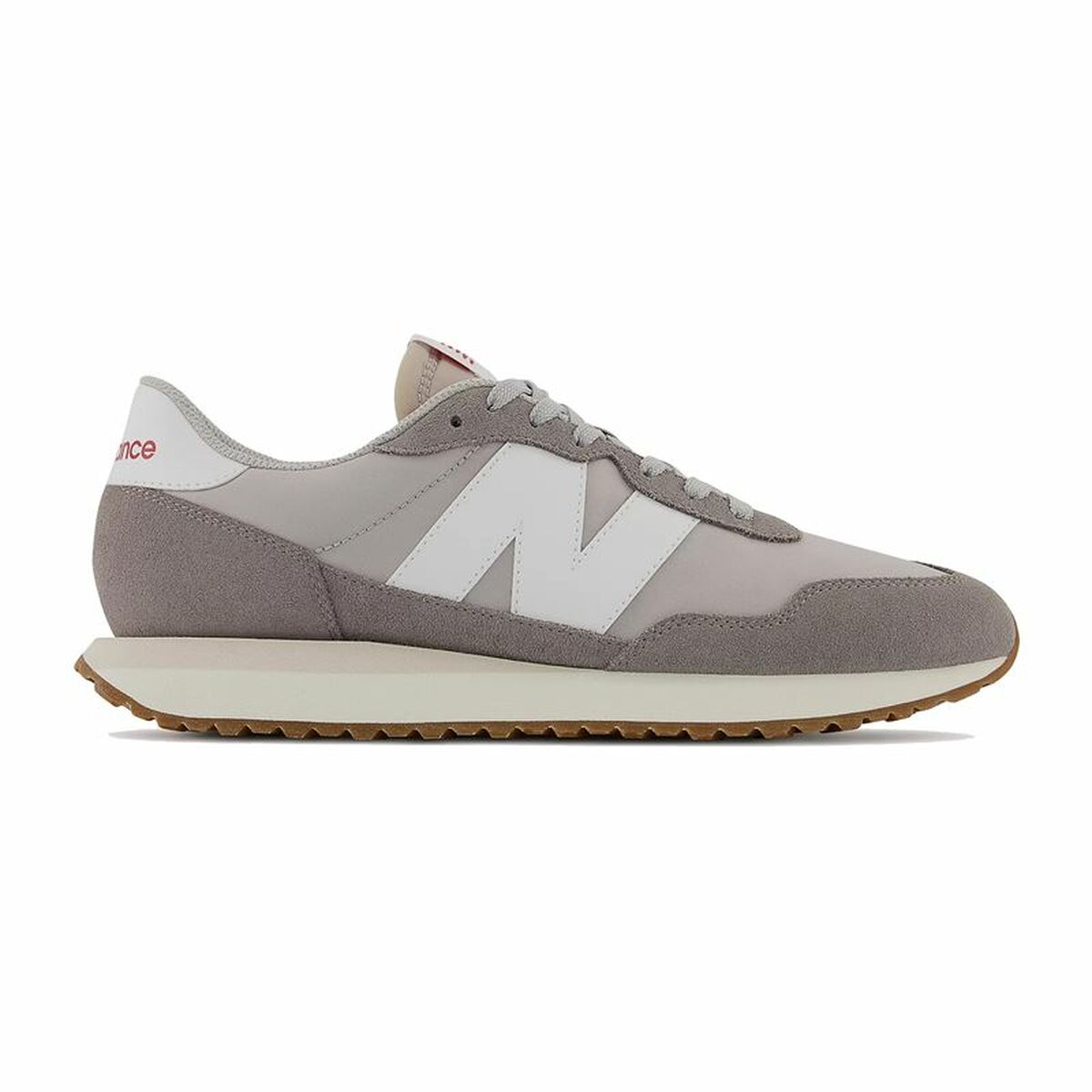"New Balance 237V Ljusgrå unisex sneaker – vy från sidan"