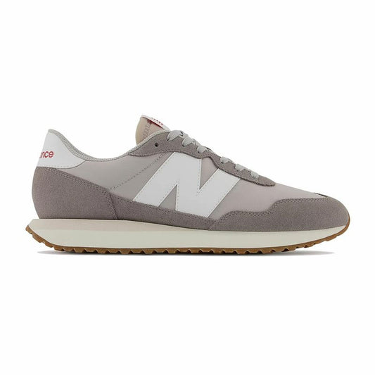 "New Balance 237V Ljusgrå unisex sneaker – vy från sidan"