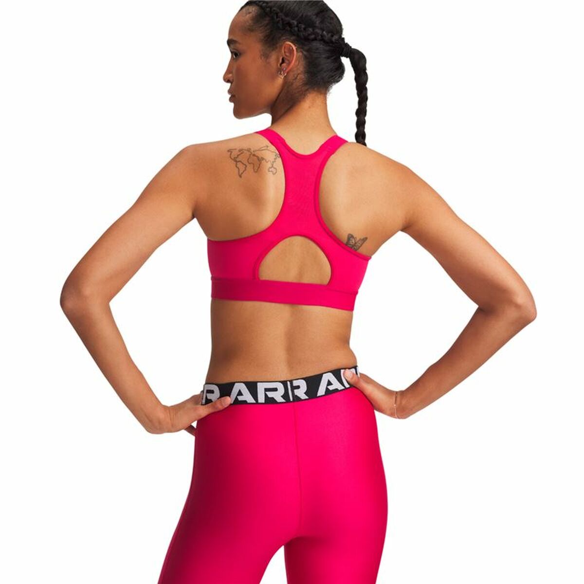 "Under Armour Heatgear High sport-bh fuchsia – baksida med justerbara axelband och ergonomisk design."
