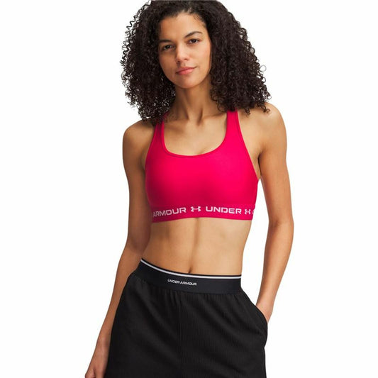 "Under Armour Crossback Mid sport-bh rosa – framsida med medium support för fitness och styrketräning."