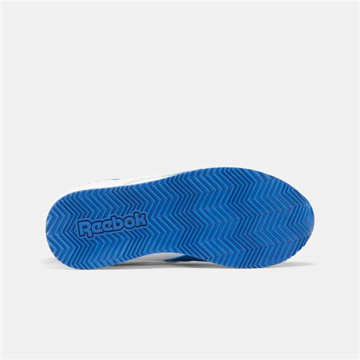 "Reebok Royal CL Jog 3.0 yttersula i gummi med greppvänligt mönster för stabilitet."