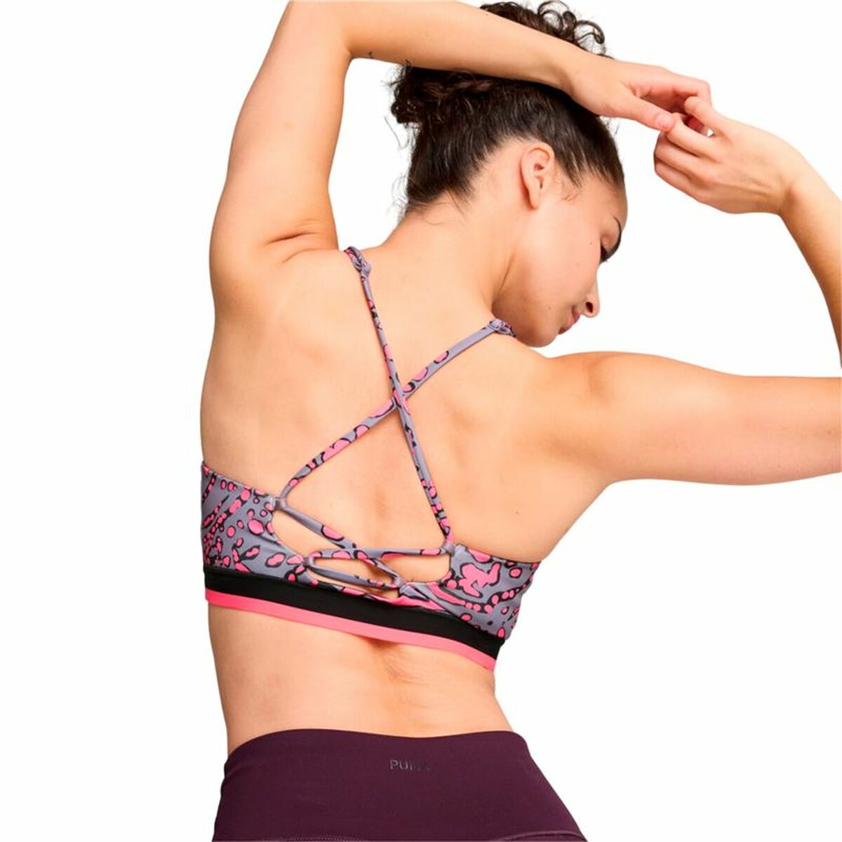 "Puma Move Hypernatural rosa – modell bakifrån visar flexibel rygg och tygdetaljer."