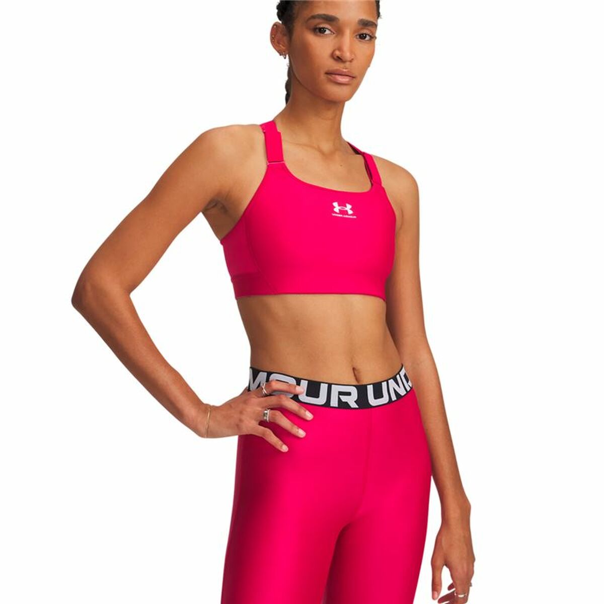 "Under Armour Heatgear High sport-bh fuchsia – framsida med hög support för löpning och intensiv träning."