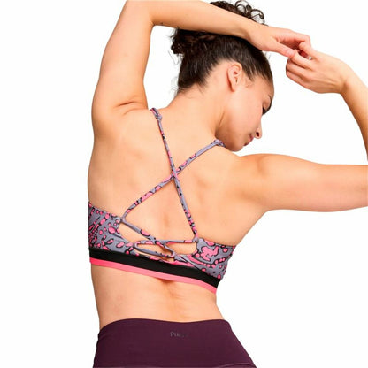 "Puma Move Hypernatural rosa – modell bakifrån visar flexibel rygg och tygdetaljer."