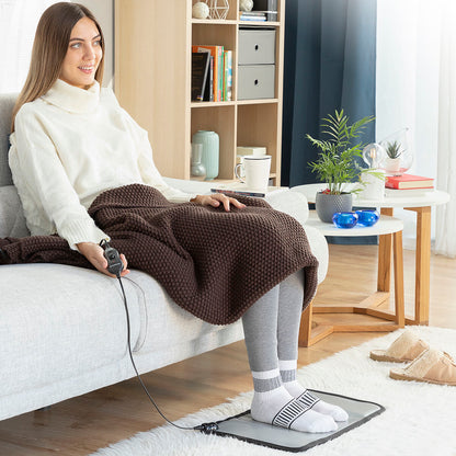 "Elektrisk värmematta för fötter med röd värmeeffekt"