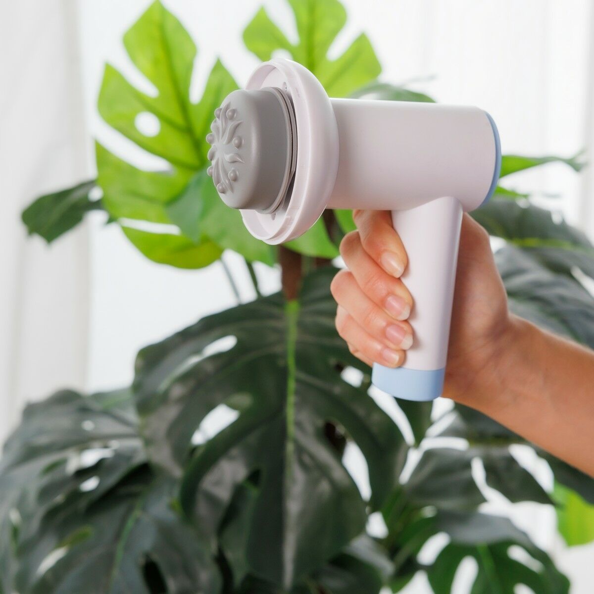 "CellyGun anticellulit massagepistol handhållen"