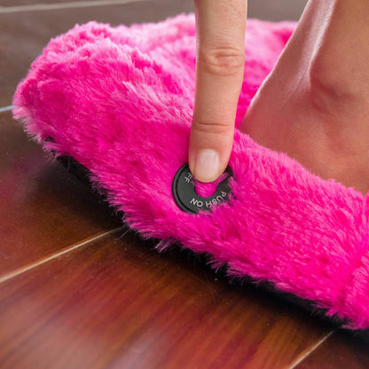 "Elektrisk fotmassör – visning av PÅ/AV-knappen"